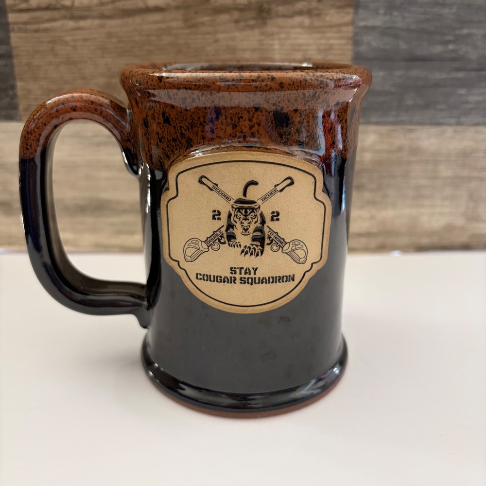 Sunset Hill Stoneware 57th Cougar Squadron Mug Handcrafted Black Brown Drip